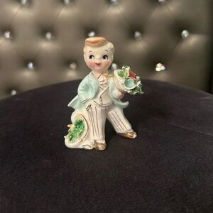 Charming Ceramic Boy Figurine with Green Details